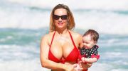 coco-austin-&-daughter-chanel,-6,-twin-in-matching-bikinis-at-water-park
